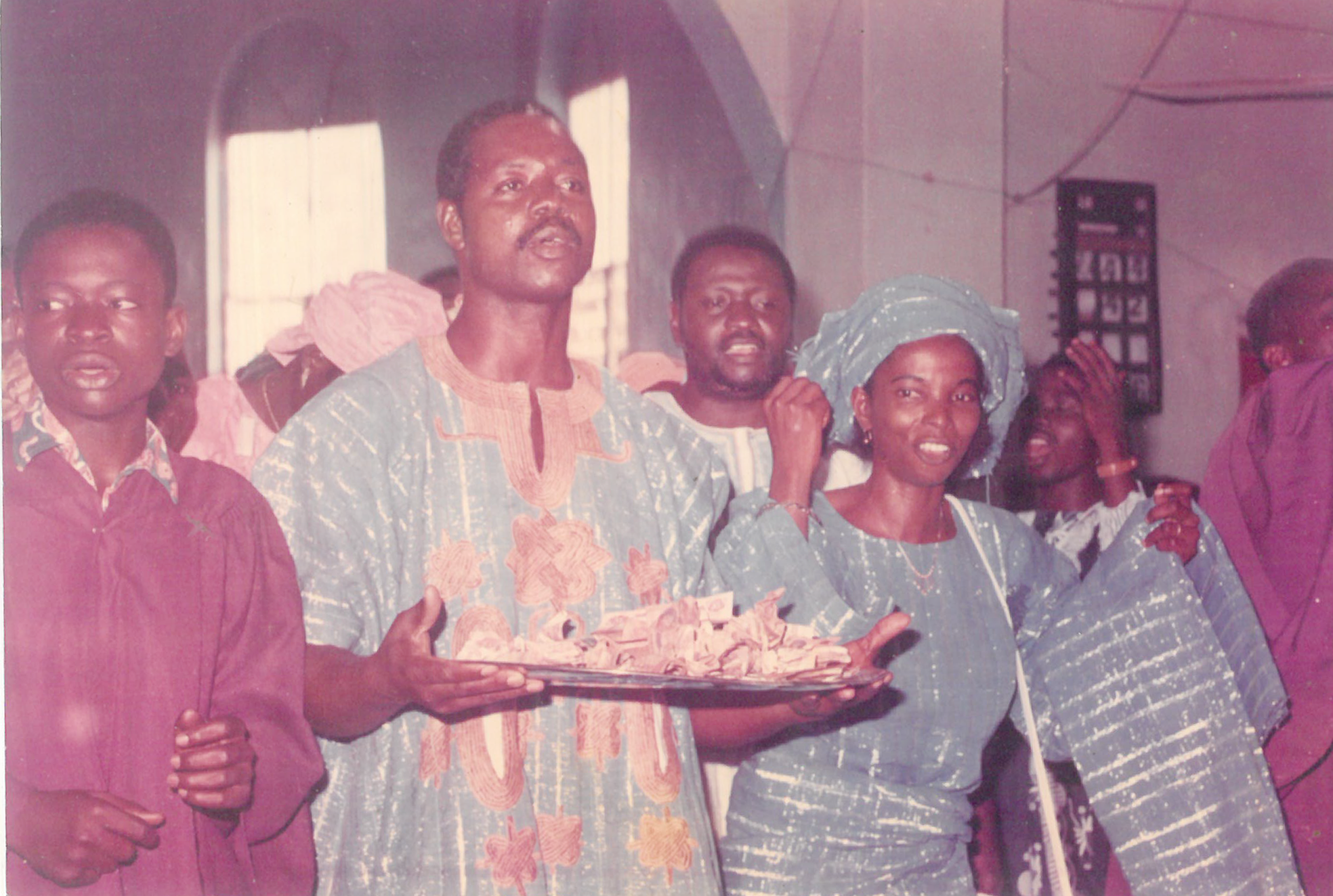 Mummy with her husband and brother at a Thanksgiving ceremony at St. John's Anglican church, Ire-Ekiti